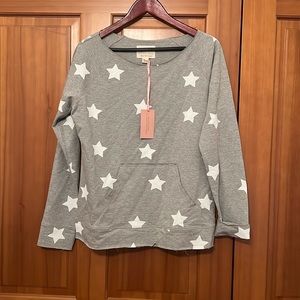Evy’s tree star sweatshirt